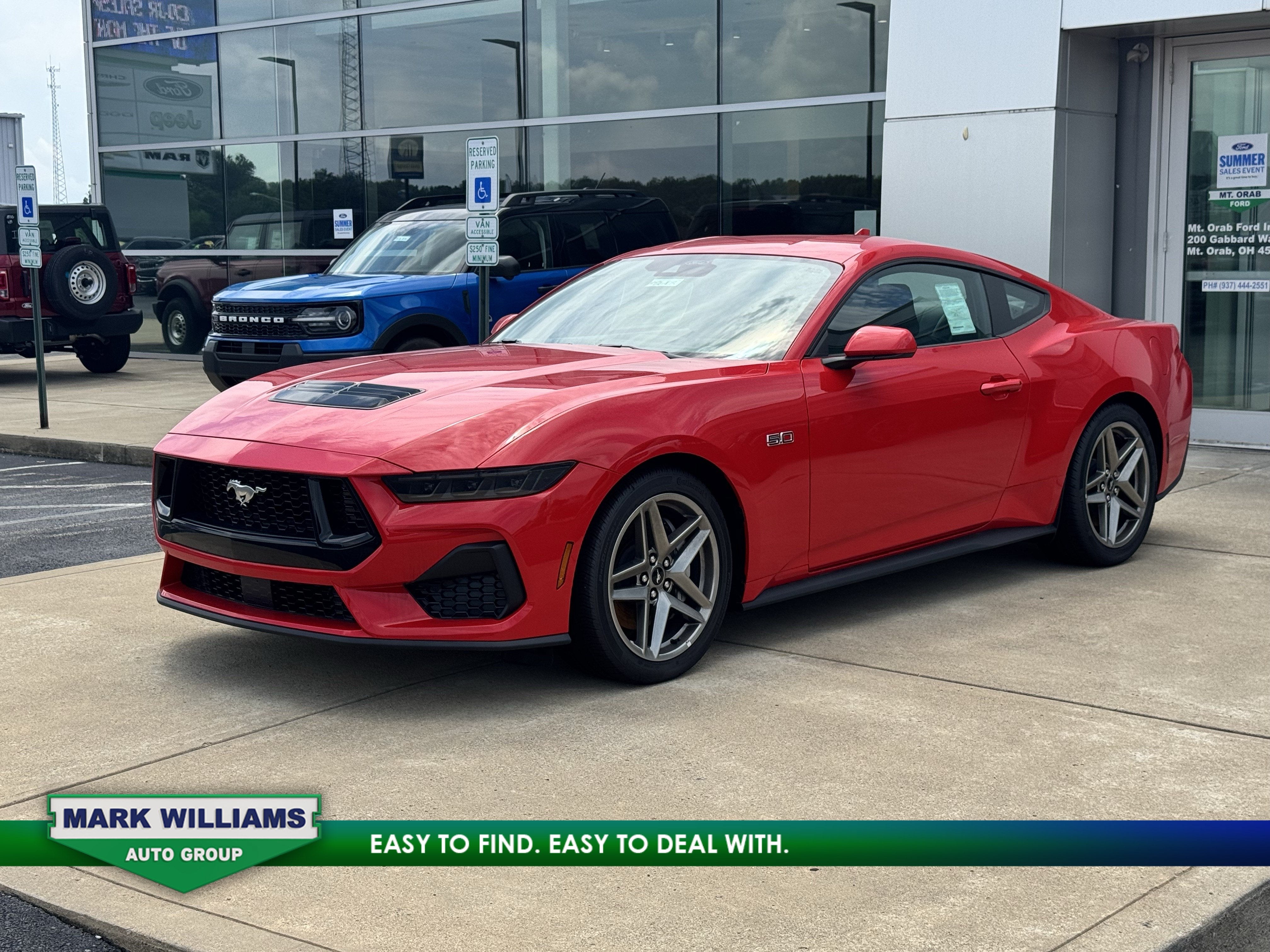 2026 Ford Mustang GT in Race Red — front three-quarter view