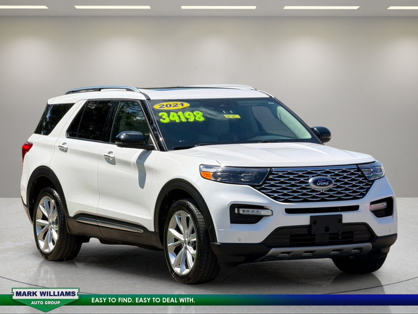 2021 Ford Explorer Platinum in White Metallic — front three-quarter view