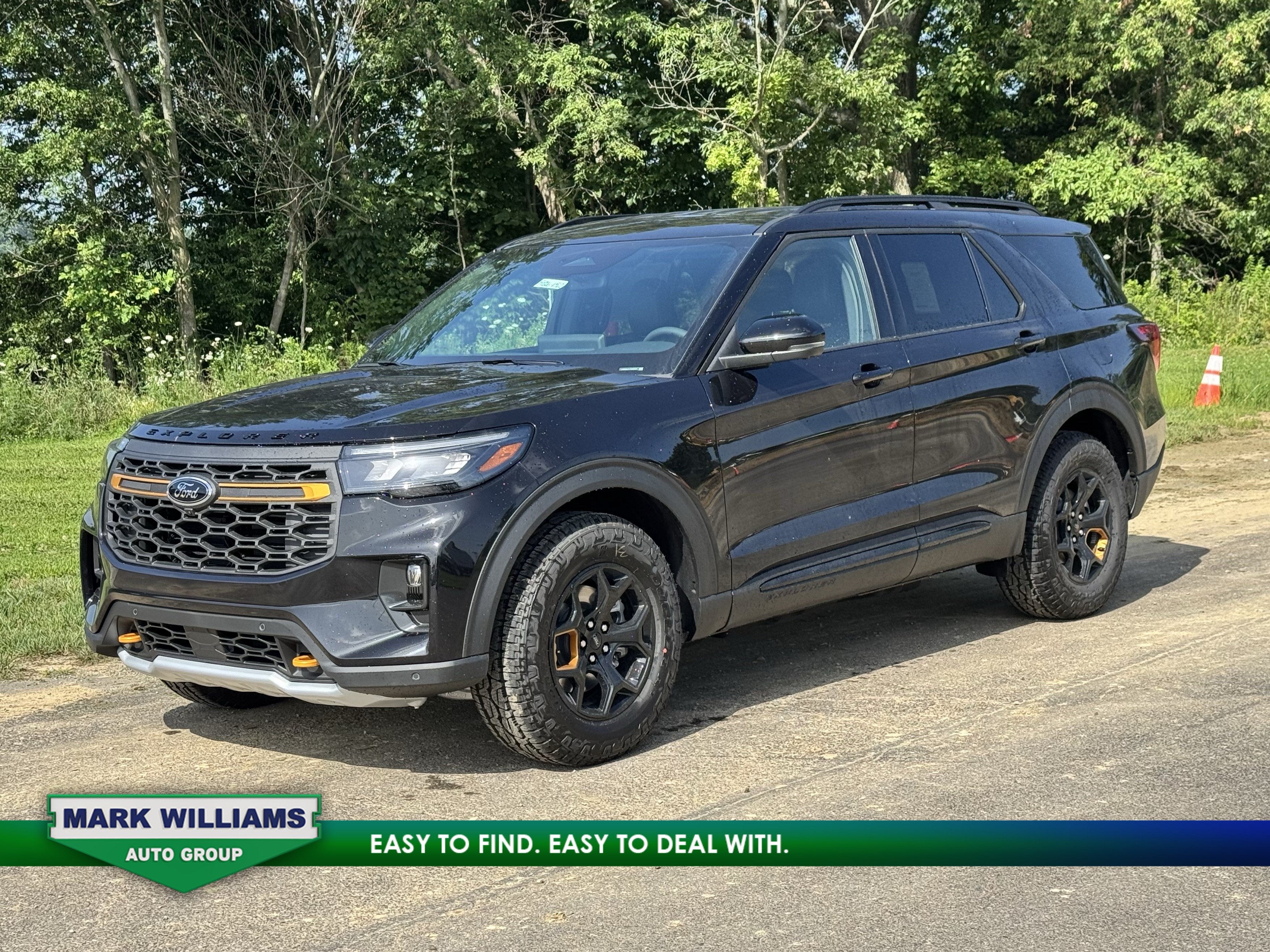 2026 Ford Explorer Tremor in Black Metallic — front three-quarter view
